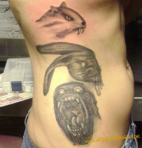 Die besten 100 Bilder in der Kategorie schlechte_tattoos: AngsteinflÃ¶ssende TierkÃ¶pfe Tattoos