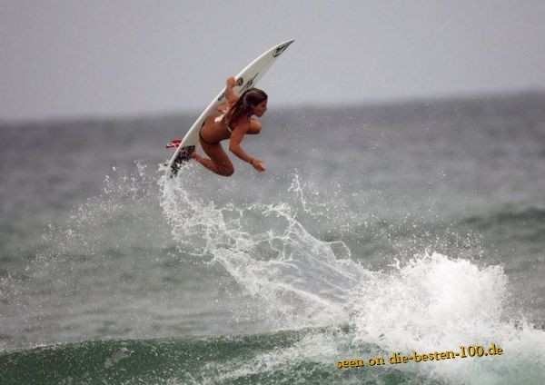 Hot female Surfer in Action