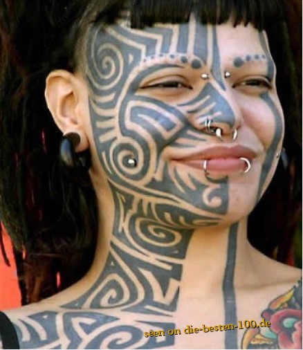 Maori-Face-Tattoo with Piercings