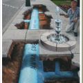 Die besten Bilder in der Kategorie strassenmalerei: Brunnen und Wasserleitung