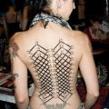Die besten Bilder:  Position 38 in tattoos - Geschnürter Rücken mit Tattoos