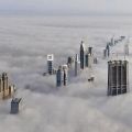 Die besten Bilder in der Kategorie wohnen: Wolkenkratzer durchstossen Wolken - amazing Skyscraper Photo