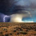 Die besten Bilder in der Kategorie wolken: Tornado mit Regen, Regenbogen und Blitz