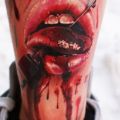 Die besten Bilder:  Position 26 in horror tattoos - Durchspiesste Zunge an Wade 3D Tatto - unglaublich Realistisch