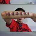 Die besten Bilder in der Kategorie tattoos: Balls in Arm