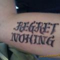 Die besten Bilder in der Kategorie schlechte_tattoos: Regret Nohing - Tattoo Schreibfehler