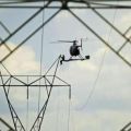 Die besten Bilder in der Kategorie gefaehrlich: Hubschrauber Stromleitung Reparatur