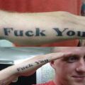Die besten Bilder in der Kategorie schlechte_tattoos: Fuck You Tattoo