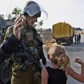 The Best Pics:  Position 64 in  - A little Palestinian girl vs. an Israeli soldier