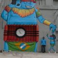 Die besten Bilder in der Kategorie graffiti: Südamerikanischer Indianer mit Sprengstoffgürtel Grafitti