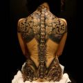 The Best Pics:  Position 7 in  - Corset, tattoo, woman, back, ornaments, skull, spine