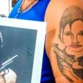 Die besten Bilder in der Kategorie schlechte_tattoos: Schlechtes Tattoo, Angelina Jolie, hässlich