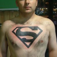 Superman Tattoo on Breast