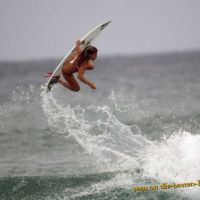 Hot female Surfer in Action